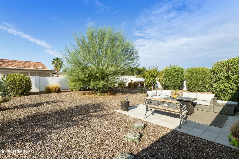 Large backyard with outdoor patio