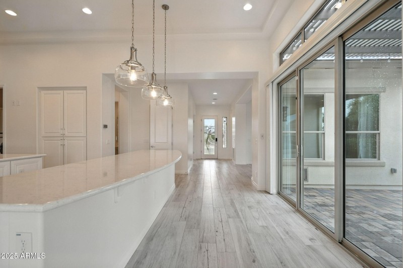 Rolling wall of glass of side patio