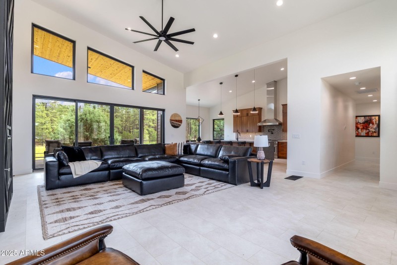Living room and view into kitchen