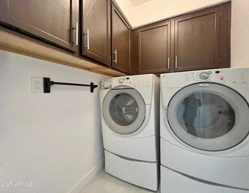 Laundry rm with cabinets