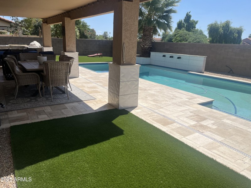Covered Patio with Pool Views