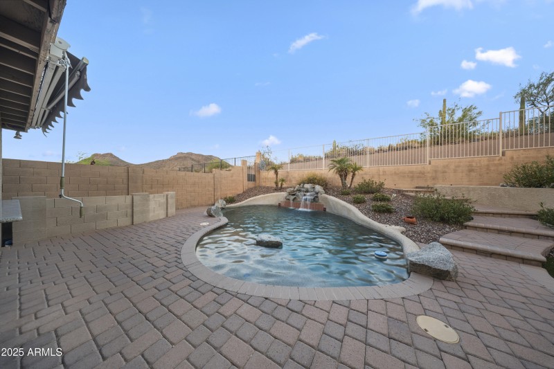 Tranquil Pool with Waterfall Feature