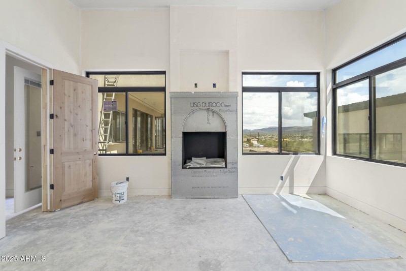 Primary bedroom with fireplace