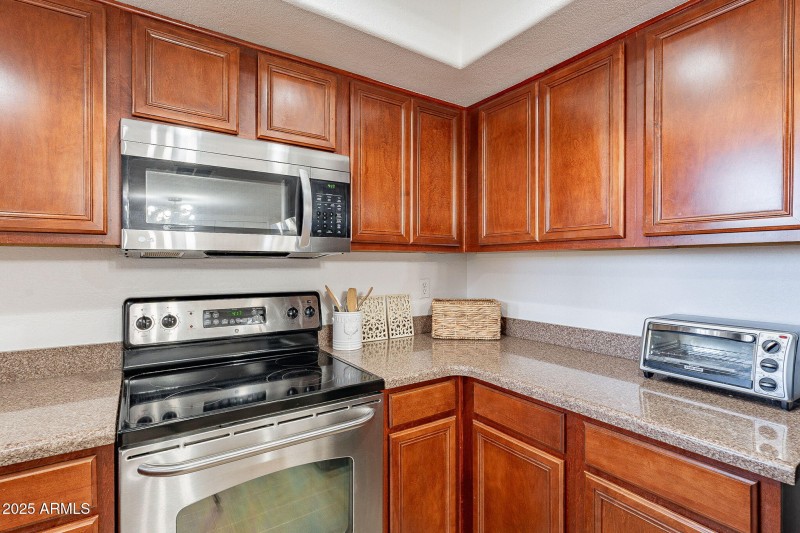GRANITE COUNTERTOPS + PLENTY OF STORAGE