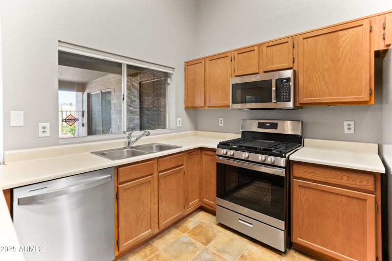 Kitchen with Window into Back Patio