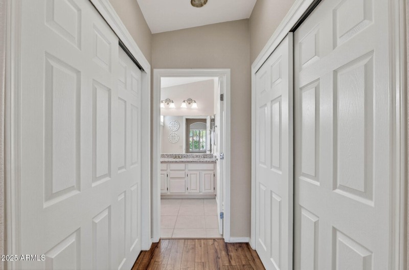 Primary Bed Closets towards Bath