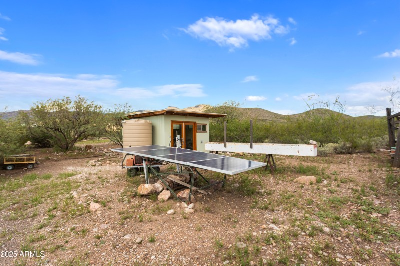 Solar panels in fron of well house