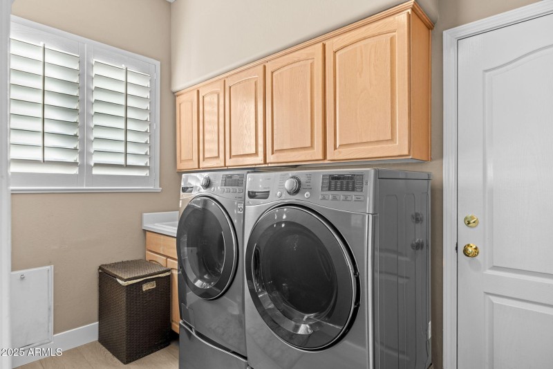 Laundry room with sink