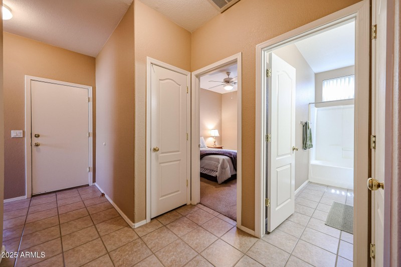 Hall to Garage, Bedroom 2, and Bathroom