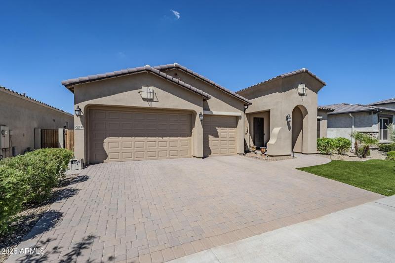 3Car Garage, Pavered Drive & Front Entry