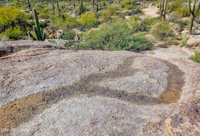 water trickles to the edge of the waterf