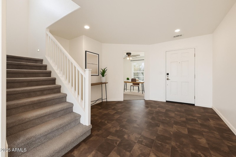 Staged Front Entry & Den