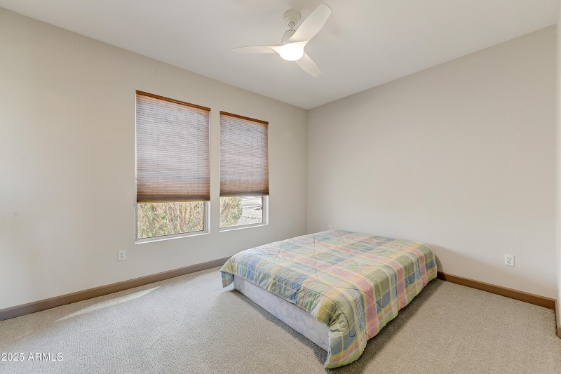 Bright Bedroom with Dual Windows
