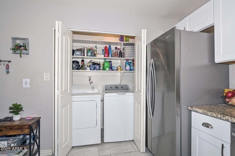 Laundry Closet with Storage Shelves