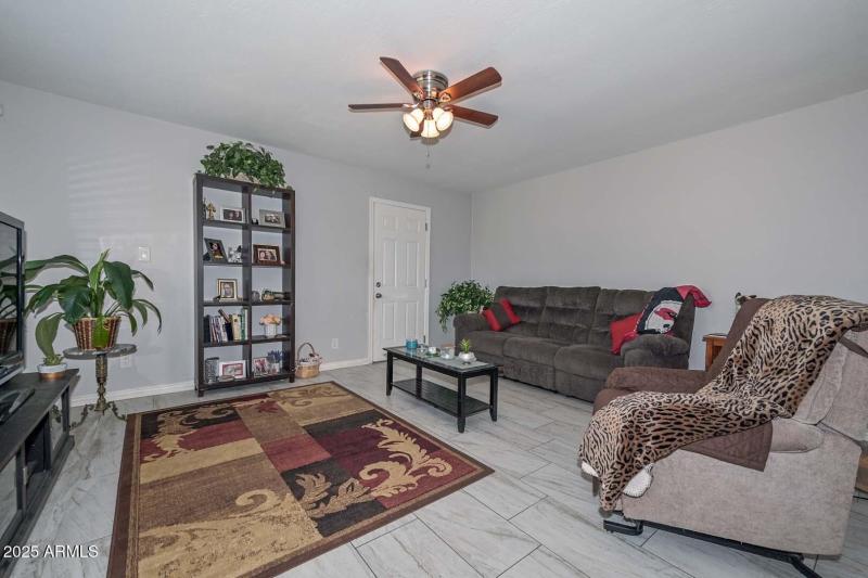 Spacious Living Room with Tile Flooring