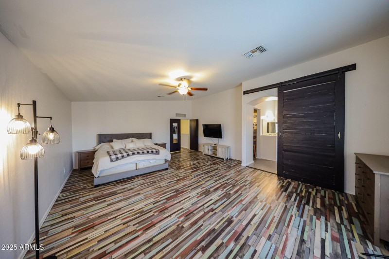 Primary suite with barn door bath