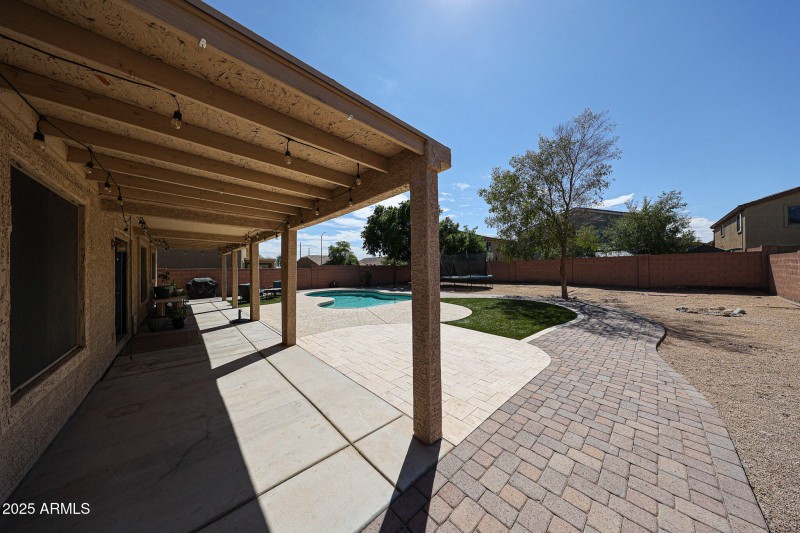 Covered patio with pool view