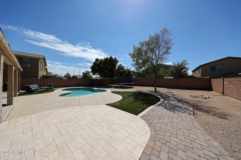 Spacious backyard with pool