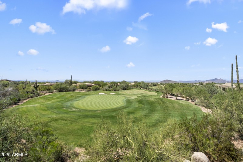 Unobstructed golf & city light views