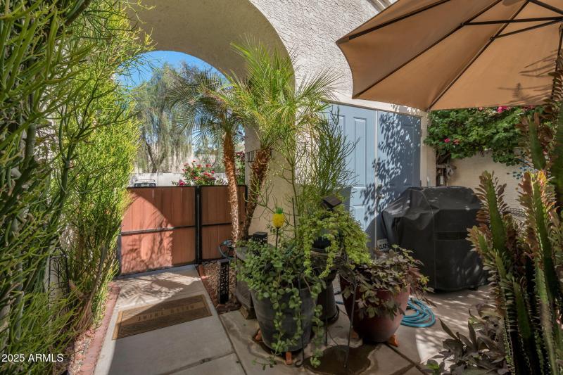 Private Patio with Lush Landscaping !