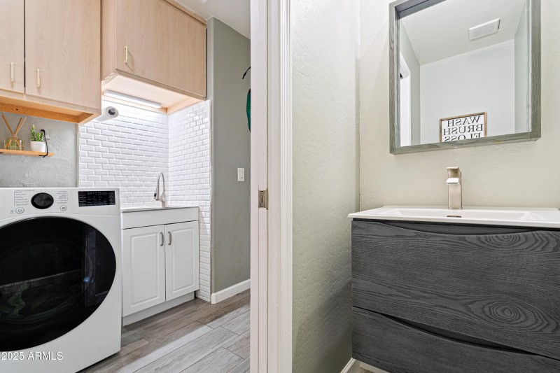 half bath and laundry area
