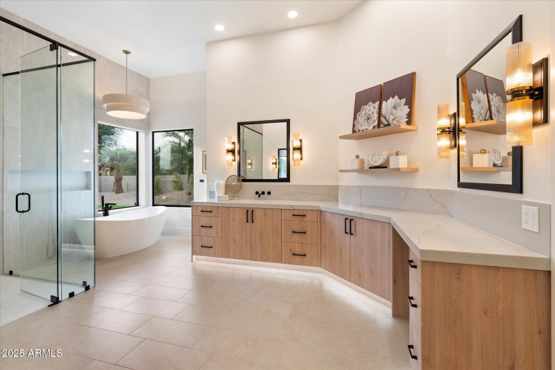 Primary bath with his and hers sides