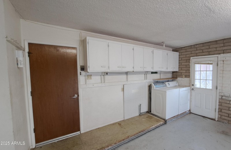 Garage service door and laundry area