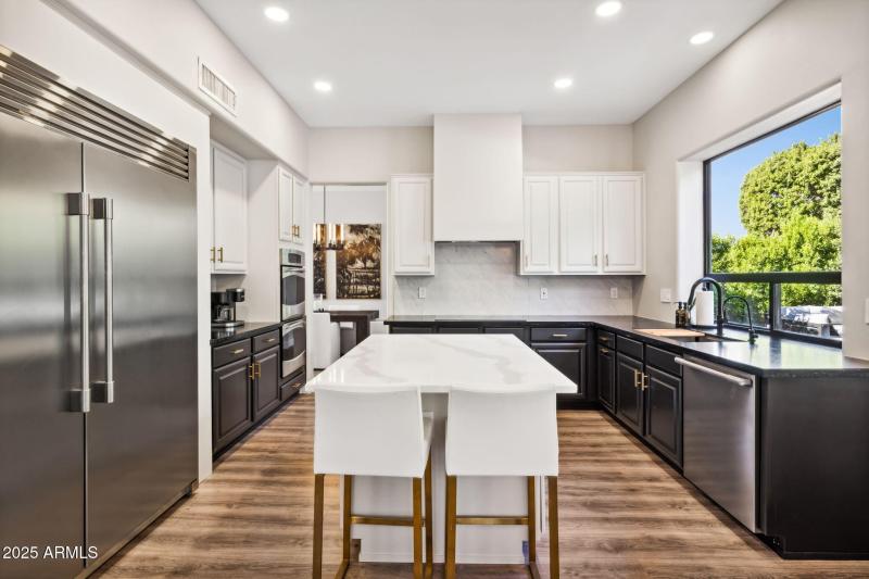 20-web-or-mls-6414-e-monte-cristo-ave