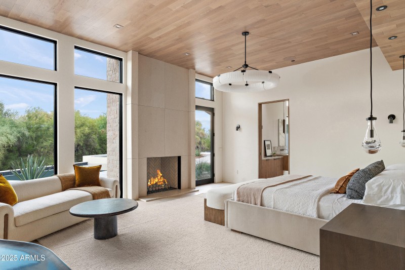 Primary bedroom w/views to pool