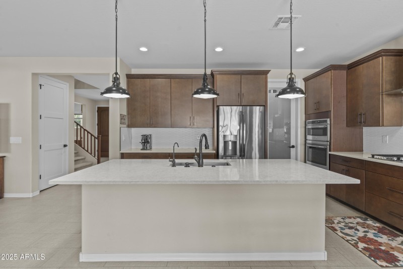 Gorgeous island with pendant lighting