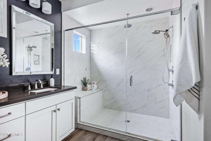 Huge walk-in shower in primary bathroom