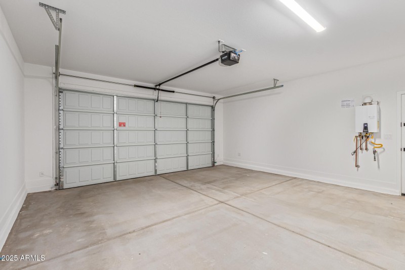 Garage with 8' Garage Door and Tankless