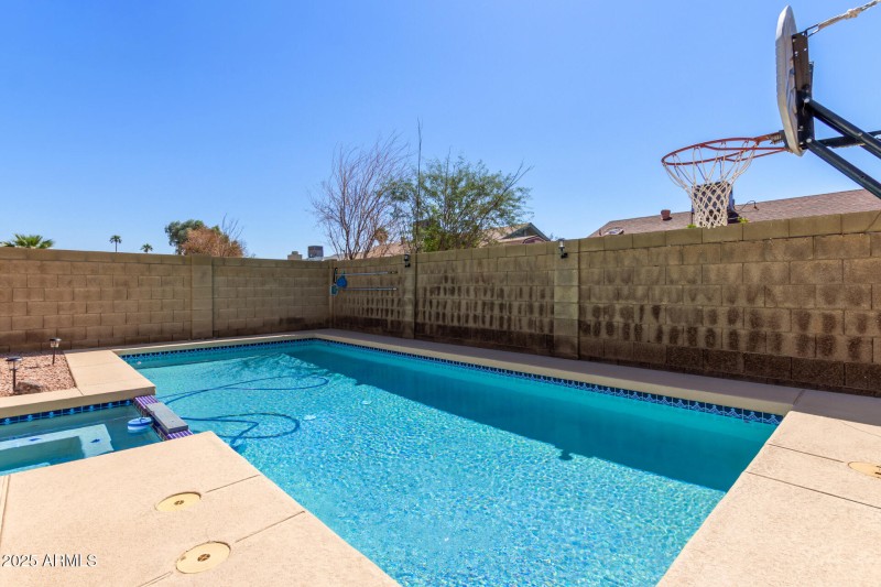 Pool with Basketball Hoop