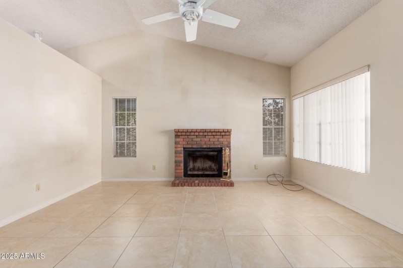 Living Room with Wood Burning Fireplace