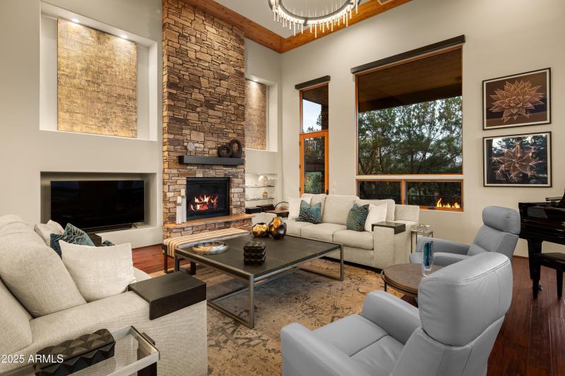 REMODELED GREAT ROOM WITH STONE FIREPLAC