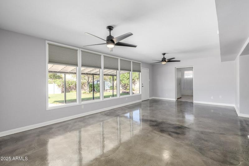 Great room and TV area with lots of nat