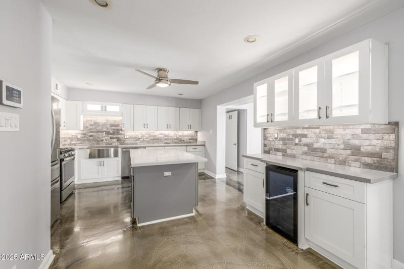 Expanded kitchen with glass upper cabine