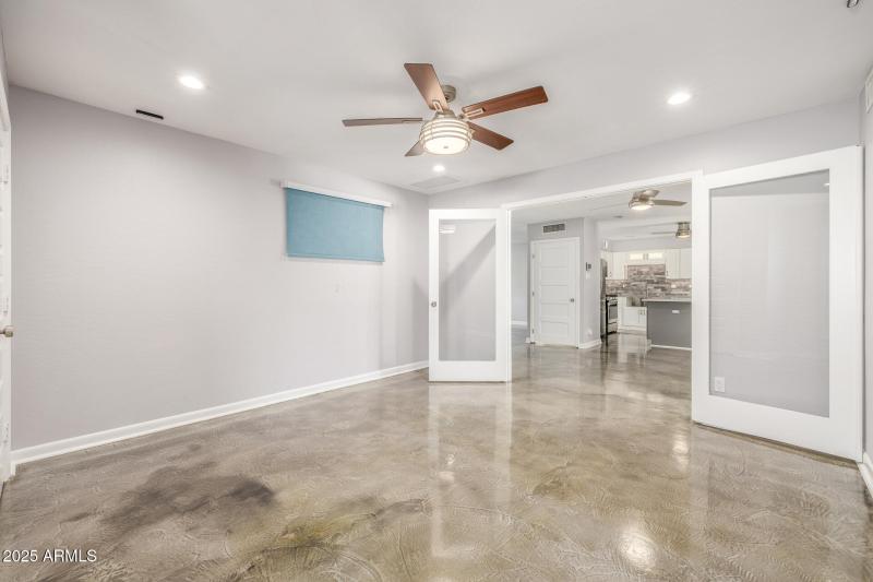 Den or 5th bedroom with french doors