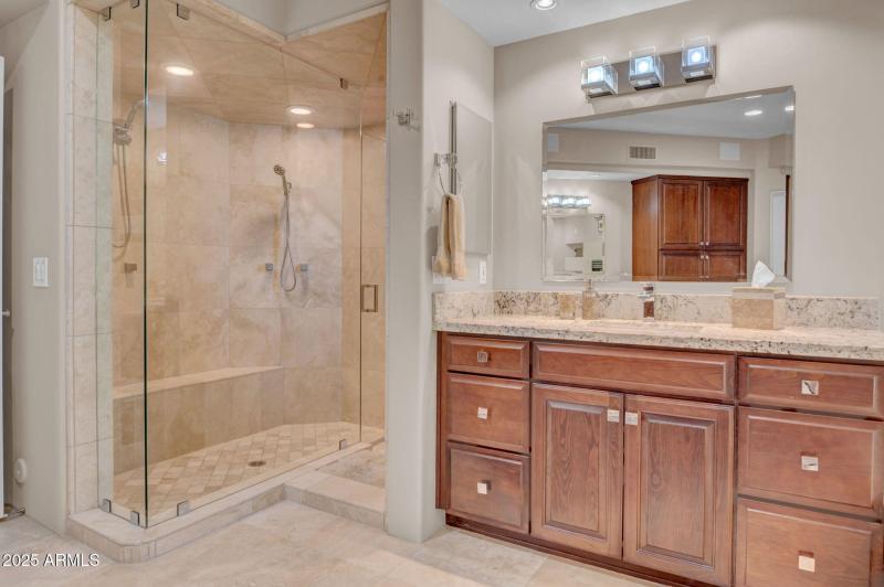 LG. WALK-IN SHOWER + HER VANITY