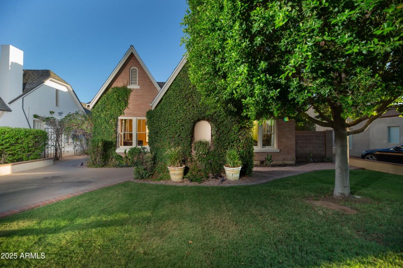 Red brick Tudor w/ creeping fig