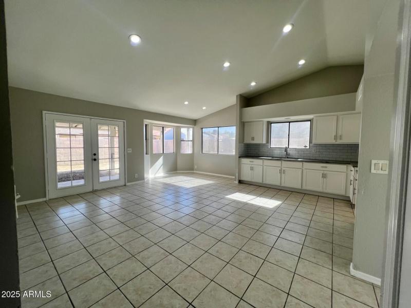 Kitchen w/ dining room & family room