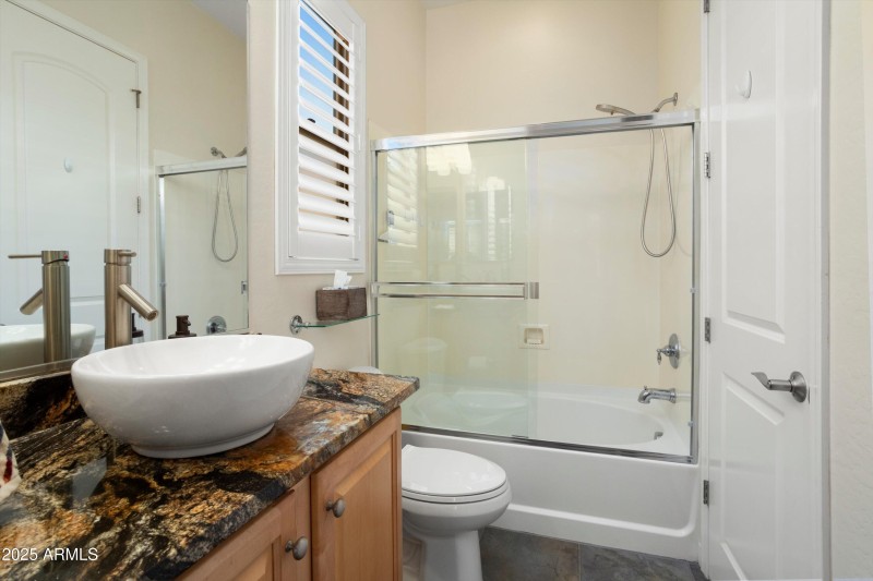 ANOTHER DOOR ACCESSES THE HALLWAY.