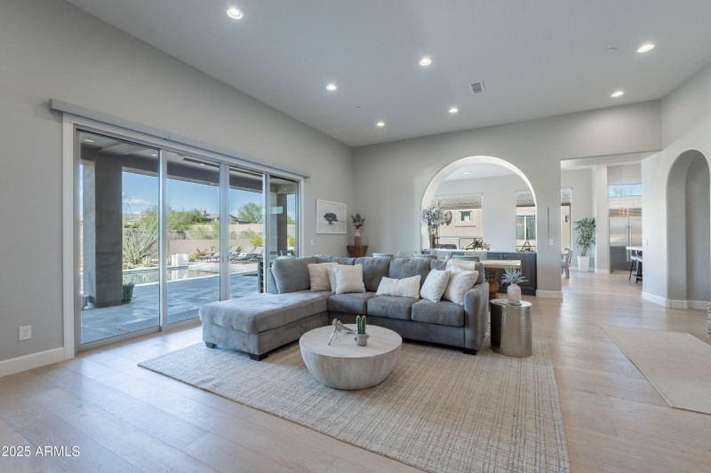 Bright Living Space with Pool View