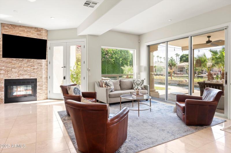 Two way fireplace into family room