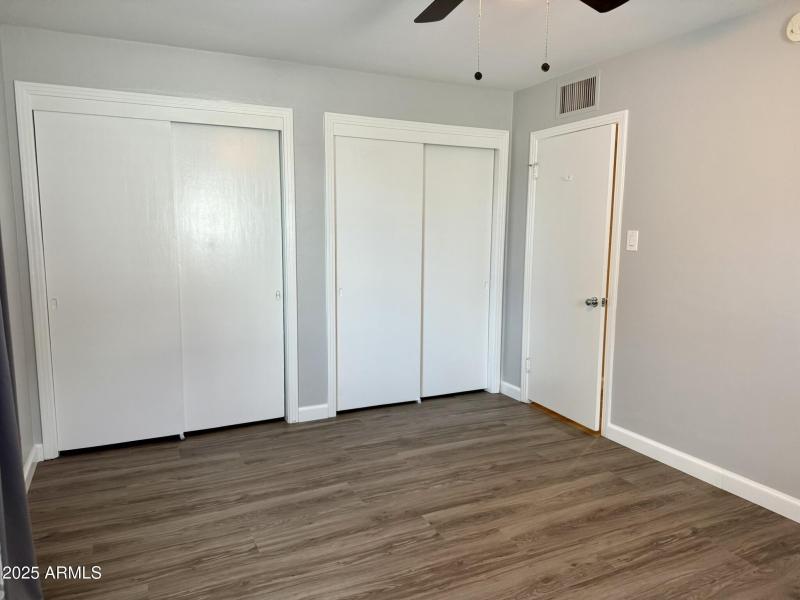 7016 double closets in master bedroom