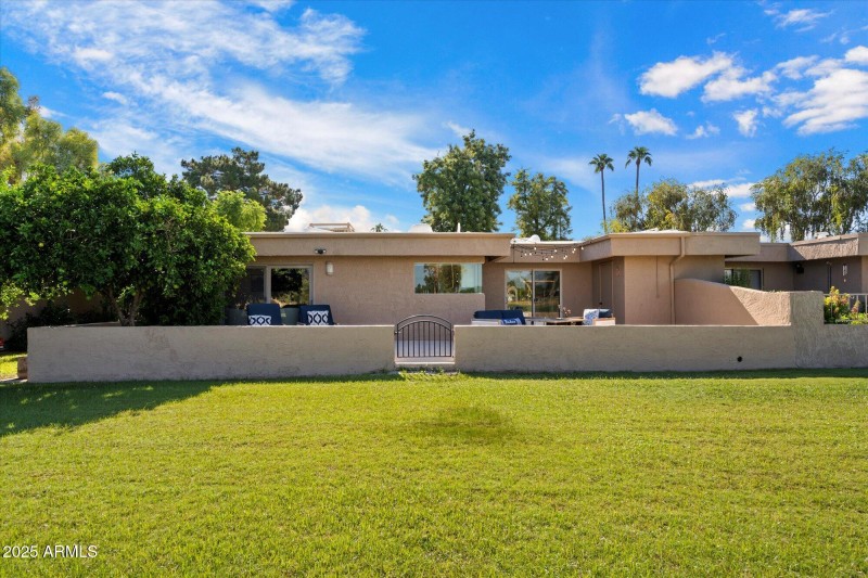 View of back patio from lake