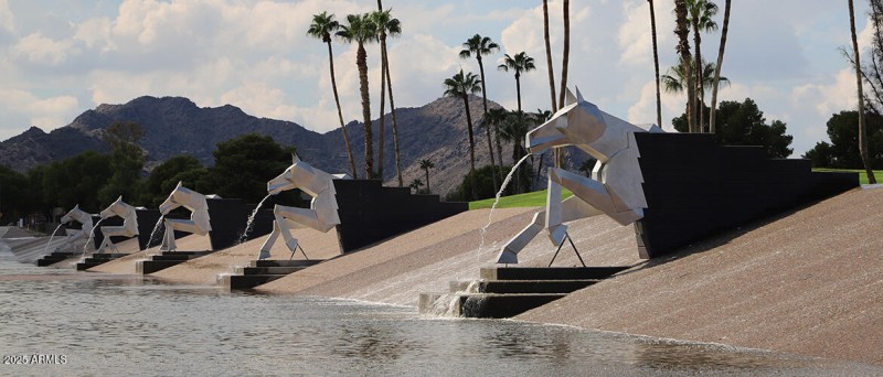 Equine gargoyles spouting water