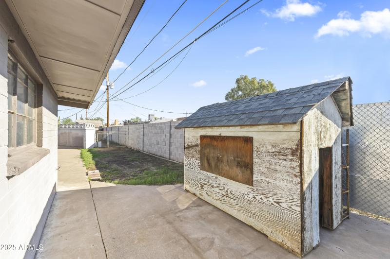 BACKYARD CONTINUES AROUND PROPERTY