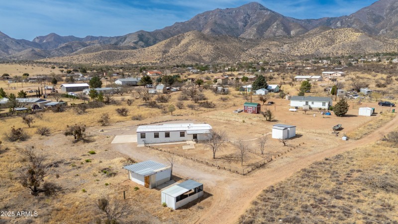 Chicken coup & horse stall in foreground