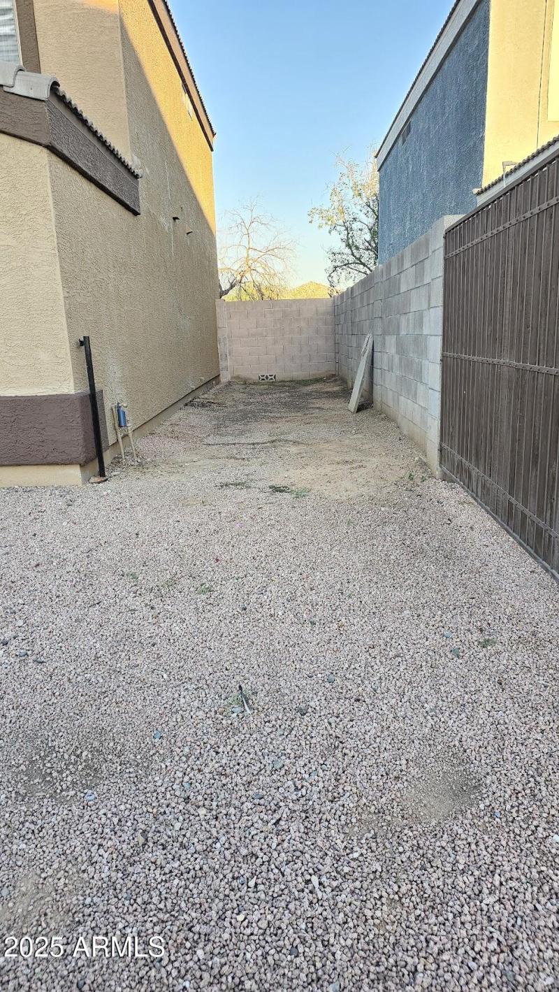 Gate on Side of Home for Extra Parking
